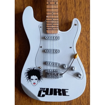 The Cure miniature elec..