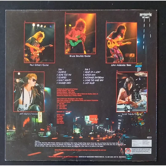 Initially released in 1987 on Roadrunner Records (RR 9601), Second Heat is the second studio album by the US heavy metal band Racer X, and a testament to their technical brilliance. The lineup features Paul Gilbert and Bruce Bouillet on blistering dual guitars, Jeff Martin on vocals, Juan Alderete on bass, and Scott Travis on drums, delivering high-speed riffs and complex arrangements that defined the shred metal genre.