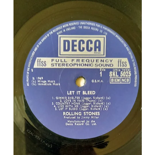This is an original UK stereo pressing of Let It Bleed by The Rolling Stones, issued on Decca SKL 5025 with the boxed Decca logo. This particular version is known for a rare label misprint, where the matrix text appears upside-down on the label—a sought-after detail for collectors.