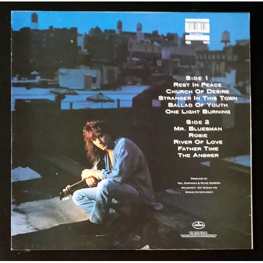 Stranger In This Town is the soulful 1991 debut solo album from Richie Sambora, best known as the legendary guitarist of Bon Jovi. This album showcases Sambora’s blues influences and rich vocal depth, stepping away from arena rock toward a more heartfelt, guitar-driven sound.