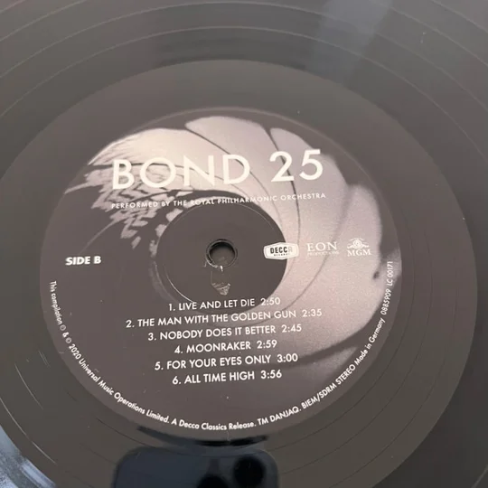 Bond 25 is a unique orchestral celebration of the complete history of James Bond theme music, performed by the Royal Philharmonic Orchestra. Recorded at Abbey Road Studios and released on Decca Classics, this 2×LP edition brings fresh symphonic arrangements to all 25 iconic title themes from the Bond film franchise