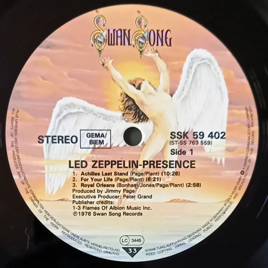 Led Zeppelin – Presence (German Reissue, Swan Song SSK 59 402) is a reissue of the band's 1976 studio album, pressed in Germany and known for its strong sound quality. Unlike the original UK and US gatefold versions, this edition comes in a standard single sleeve, with the iconic Hypgnosis-designed cover art featuring “The Object” in full detail.