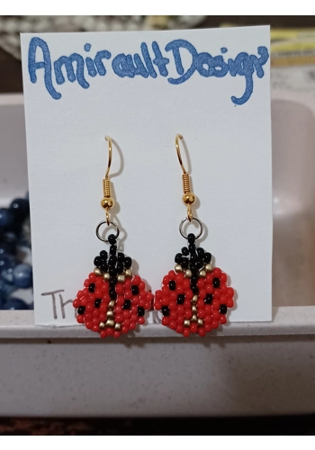 Flat beaded ladybug ear..