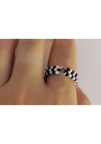 Beaded ring with charm