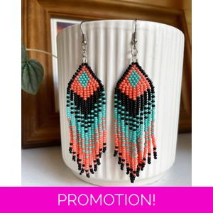 Designed to evoke a sense of movement and vivacity
Black, Coral, and Aqua