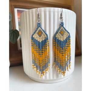 Designed to evoke a sense of movement and vivacity
Tangerine, Teal, and Beige