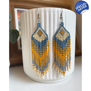 Designed to evoke a sense of movement and vivacity
Tangerine, Teal, and Beige