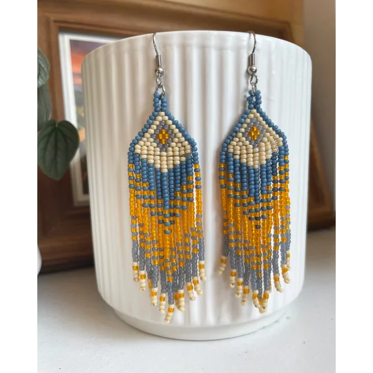 Designed to evoke a sense of movement and vivacity
Tangerine, Teal, and Beige