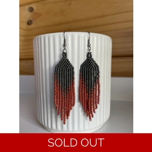 Handmade beaded Earrings

Where colours cascade in a breathtaking display of vibrancy and elegance. Each bead is carefully selected to create a mesmerising gradient effect, reminiscent of a cascading waterfall of hues. 

Black, sparkley red, and red