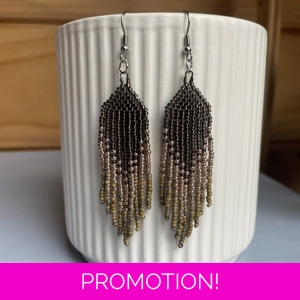 Handmade beaded Earrings,

Where colours cascade in a breathtaking display of vibrancy and elegance. Each bead is carefully selected to create a mesmerising gradient effect, reminiscent of a cascading waterfall of hues. 
Earthy Tones