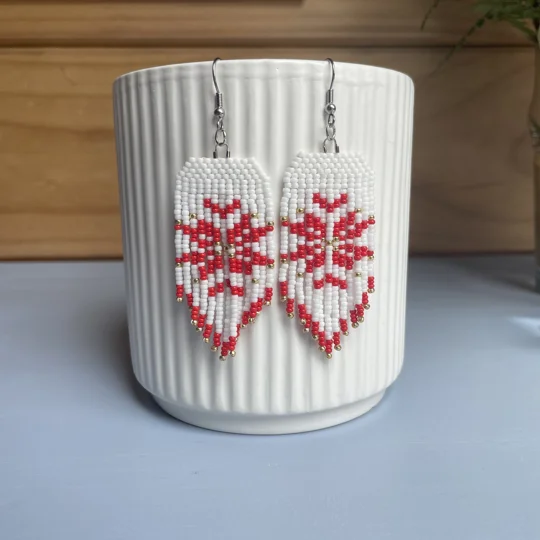 Add festive cheer to your style with our handcrafted Christmas earrings in classic white and red - Poinsettia