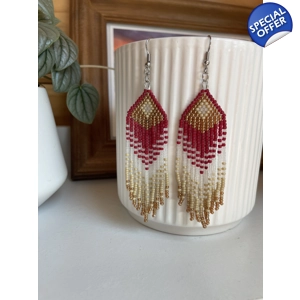 Designed to evoke a sense of movement and vivacity

Ted, Frosted White, and Gold