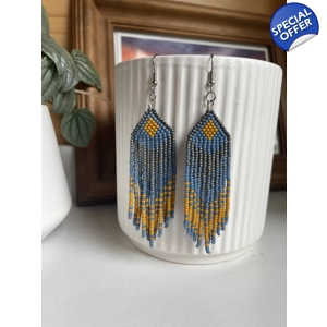 Designed to evoke a sense of movement and vivacity.

Mustard, Grey, and Teal Colors