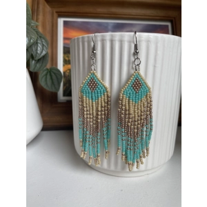 Designed to evoke a sense of movement and vivacity
Aqua, Beige, Tan