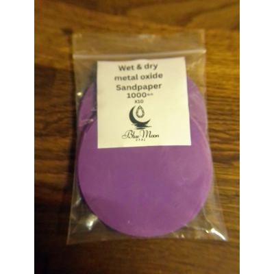 Wet & dry metal oxide sandpaper 1000 grit x 10 Wet & dry metal oxide sandpaper 1000 grit x 10