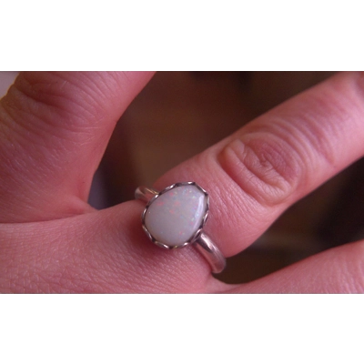 White opal in gallery ring