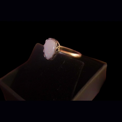 White opal in gallery ring