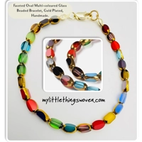 Faceted Oval Multi-coloured Glass Bead..