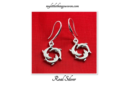 Silver Dolphins Swimming Earrings, for pierced ears.Silver..