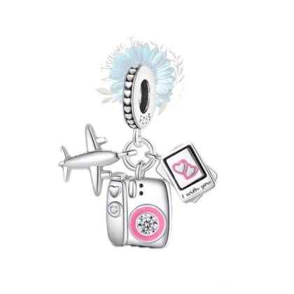 Camera, photos and plane charm