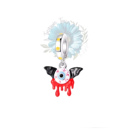 Eye and wings charm Eye and wings charm