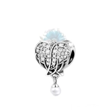 Jewelled wings and pearl charm