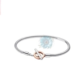 Two tone t-bar charm bracelet