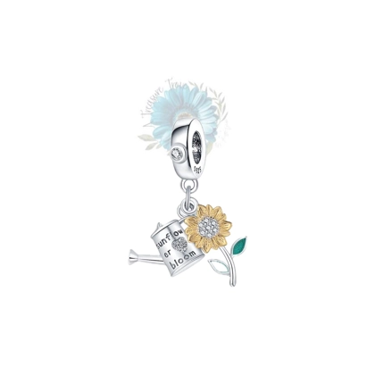 Sunflower and watering can charm Sunflower and watering can charm