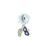Feather and black mask charm