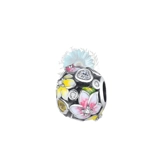 Round pink and yellow charm