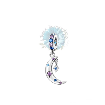 Silver jewelled moon and star charm Silver jewelled moon and star charm