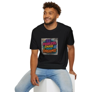 Graffiti T-shirt with motivational quote 'Be Fearless, Chase Your Dreams' in vivid neon colors on a distressed brick background