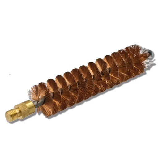 Bisley long wool mop and phosphor bronze gun cleaning brush on a workshop bench – The Country Sports Store Workshop Collection.