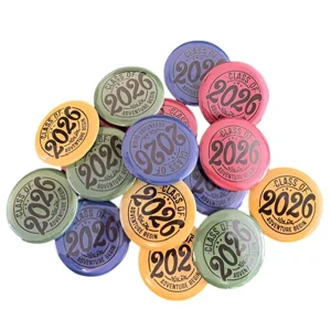 Pile of class of 2026 badges