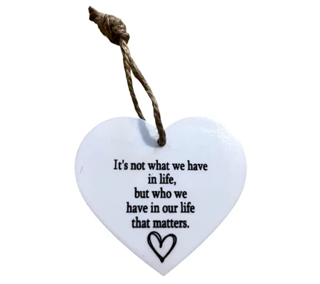 It's not what we have in life Heart shaped plaque / Sign