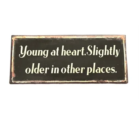 Young at heart metal sign.
