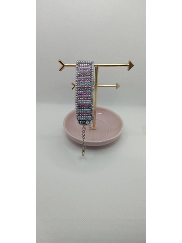 Sewn beads bracelet with faux leather band - pearl colours