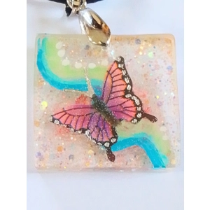 Handmade pendant butterfly and glitter detail
