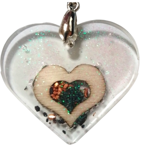 Handmade pendant heart shaped with glitter themes