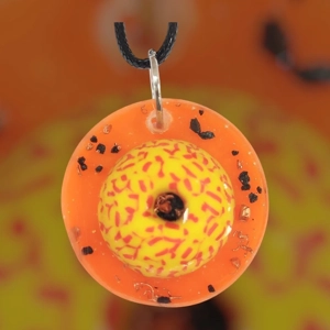 Cosmic pendant with EMF protection representing the Sun