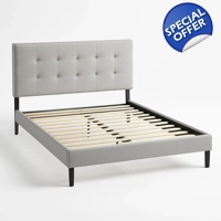 Gray bed with frame and slats