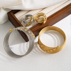 Textured coiled bangle with matching ring