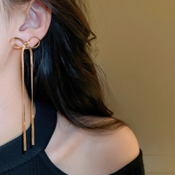 Long exaggerated simple bow drop earrings