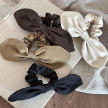 Hair scrunchie with bow