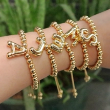 Beaded bracelet with bu..