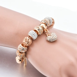 Zircon bangle with heart shape pendant