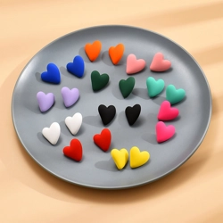 Acrylic heart shaped ear studs