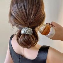 Hair tie with acrylic hair cuff