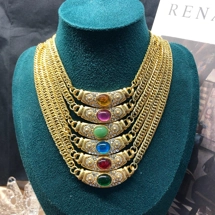 Necklace with semi-circ..