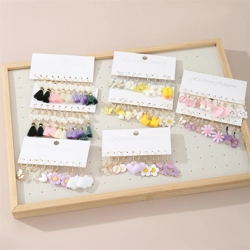 Sets of 12 pairs of drop earrings